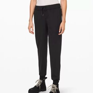 Lululemon Black Track Pants with Tapered Fit and Elastic Cuffs